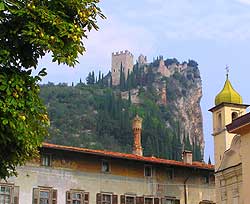 The 12th-century Castello Di Arco overlooking its cobblestone streets and ancient piazza